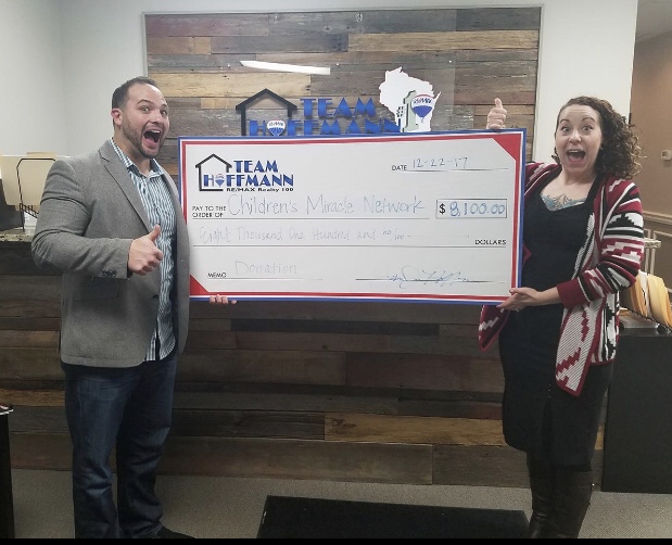 Read more about the article Team Hoffmann Presents Children’s Miracle Network of Wisconsin with Donation!
